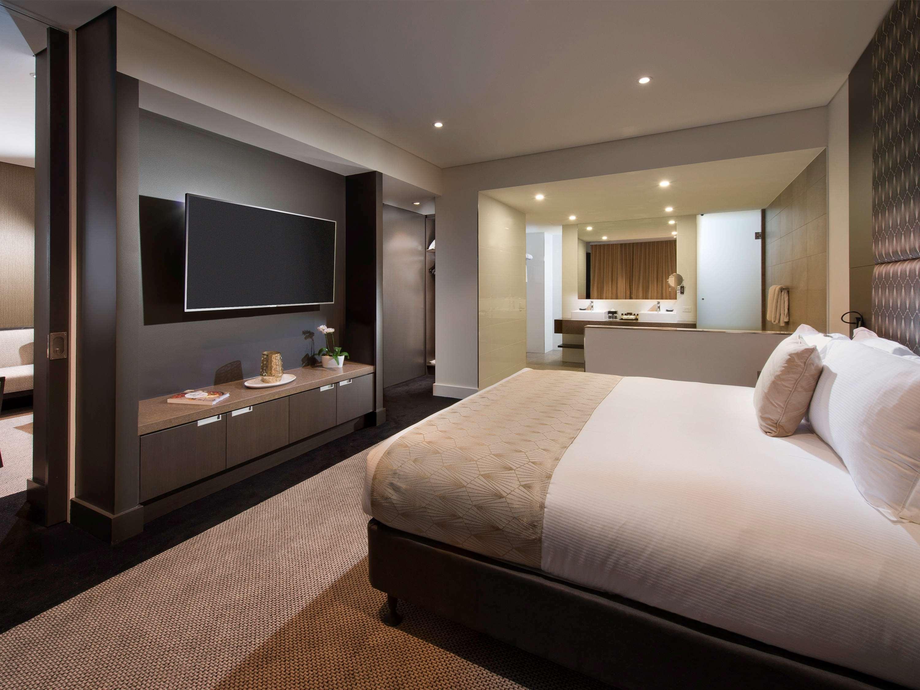 Pullman Brisbane Airport Hotel Luaran gambar A bedroom at the hotel